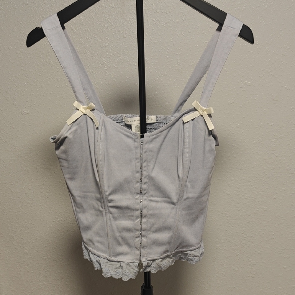 Elegant Gray Sleeveless Top with Bow Accents